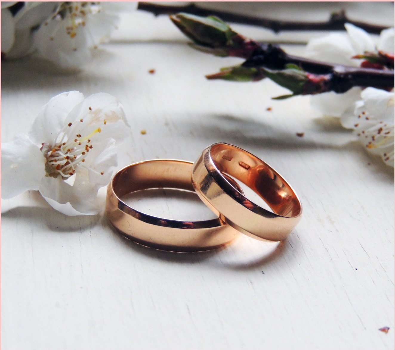 Abundant florals in cream and blush, composing a wedding room