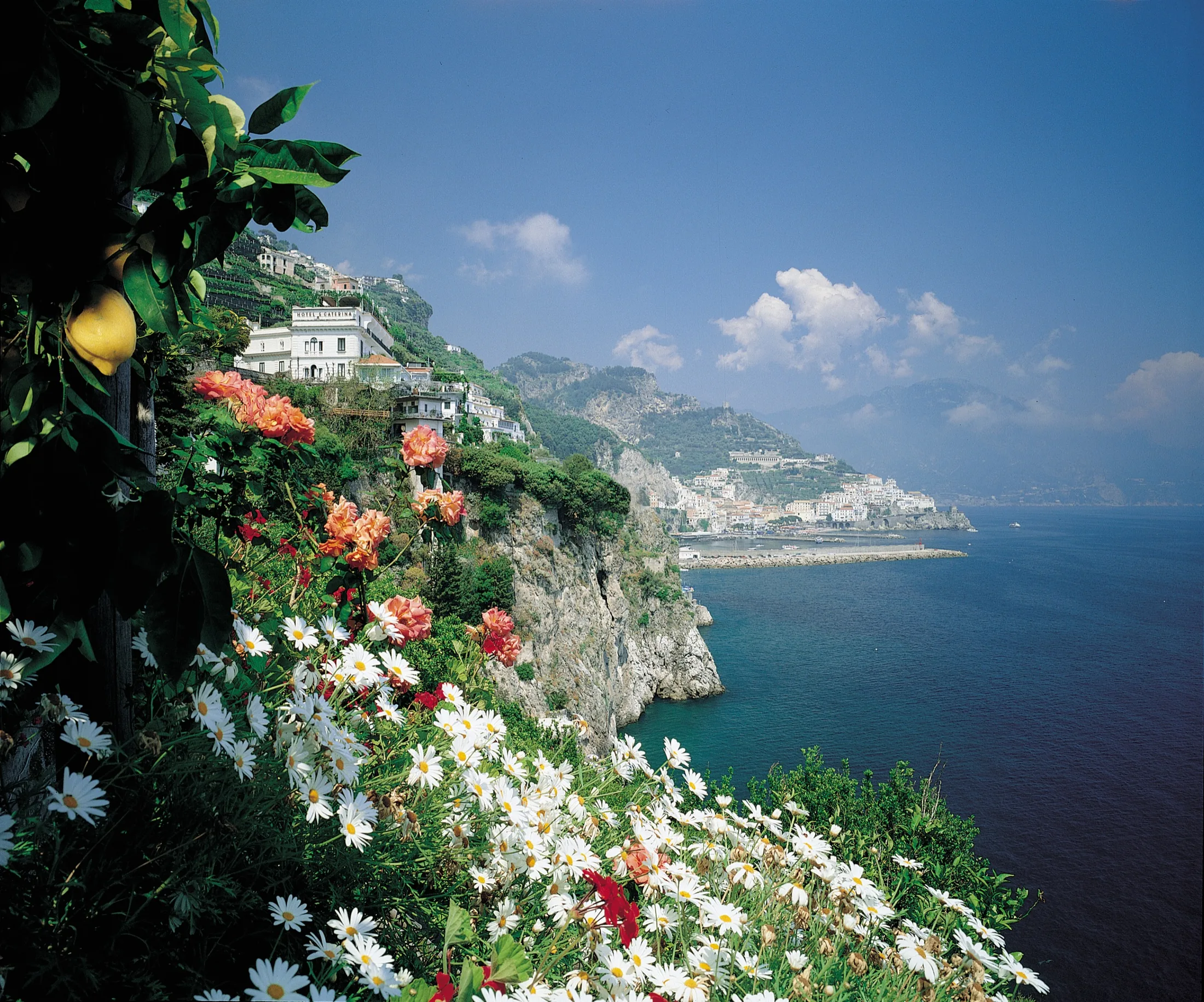 Hotel Santa Caterina on the Amalfi cliff, with lemon gardens and the harbour beyond