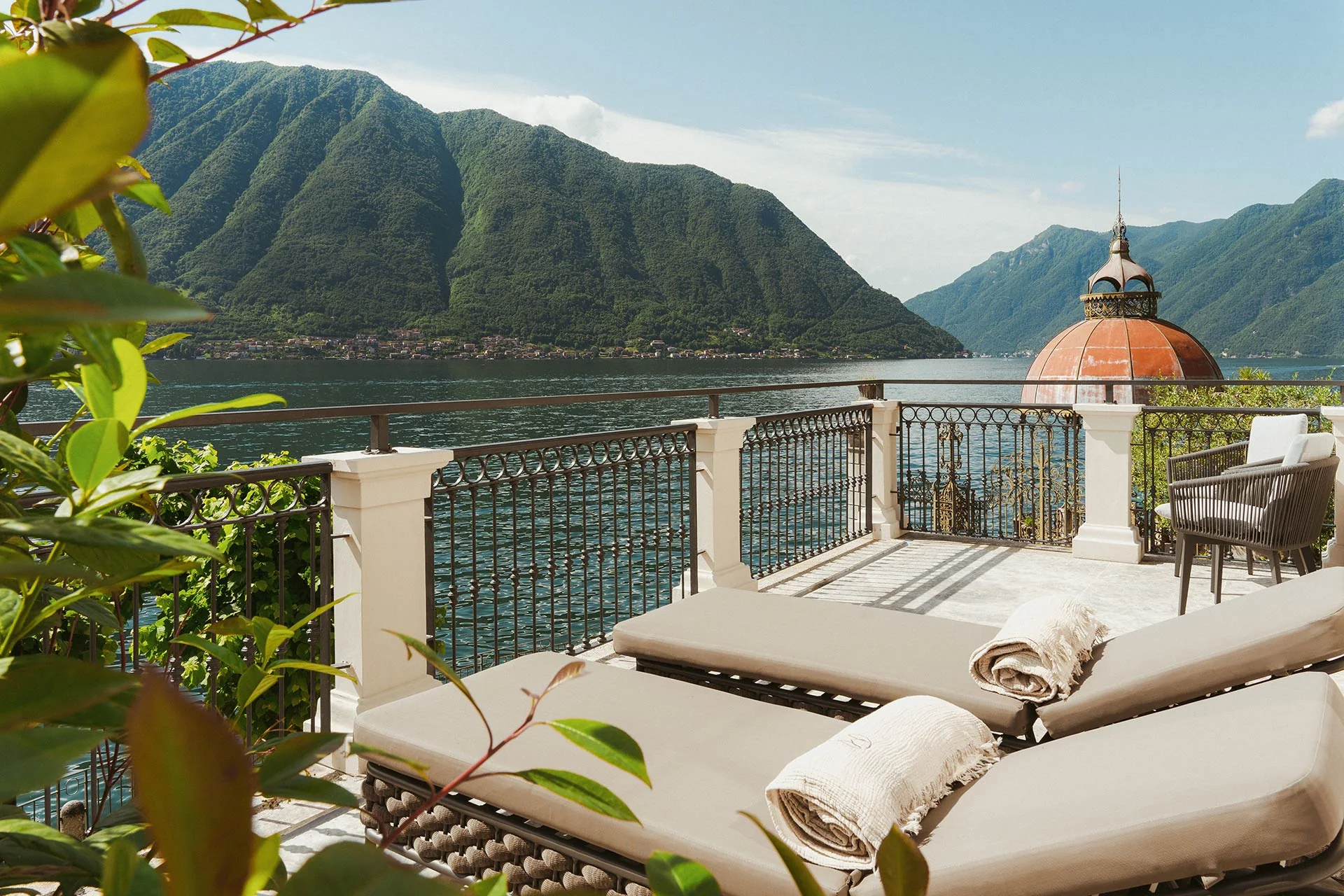 MUSA Lago di Como in Sala Comacina: terrace, lake and the property’s copper dome, with Isola Comacina across the water