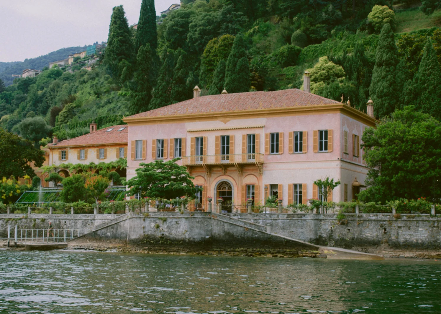 Villa Pizzo on Lake Como, the lakeside villa and stone landing seen from the water