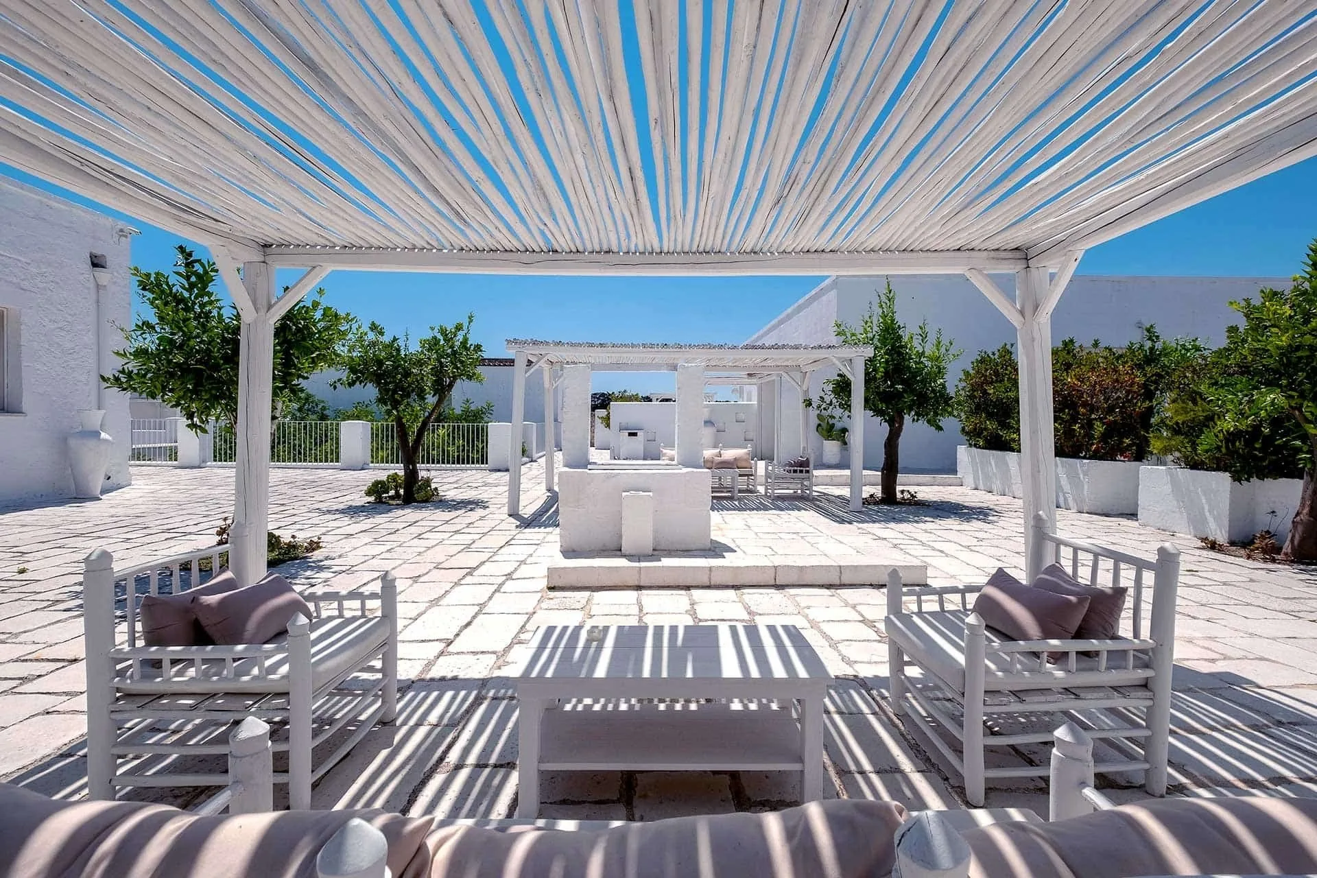 Baglioni Masseria Muzza near Otranto: the white masseria terrace and pergolas