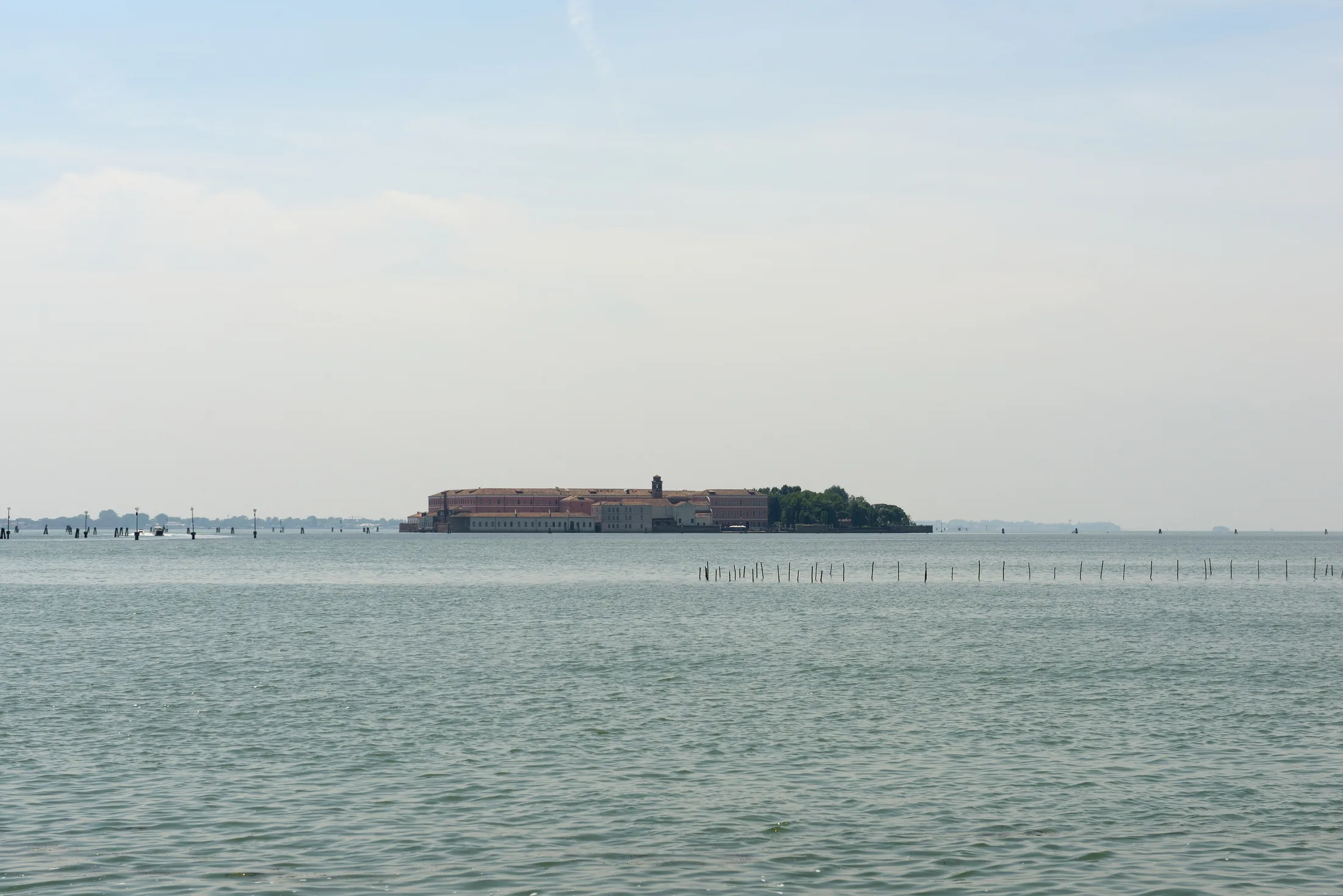 Isola di San Clemente from the water: island, campanile and the palace-monastery